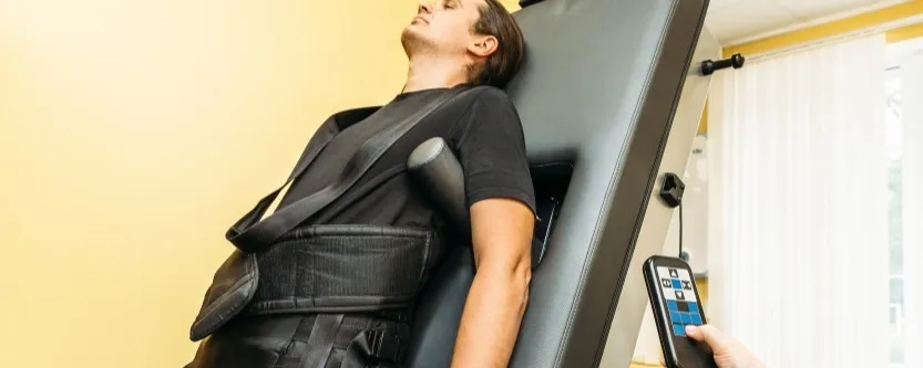 Patient receiving spinal decompression therapy for a herniated disc at Main Street Wellness in Nashua, NH